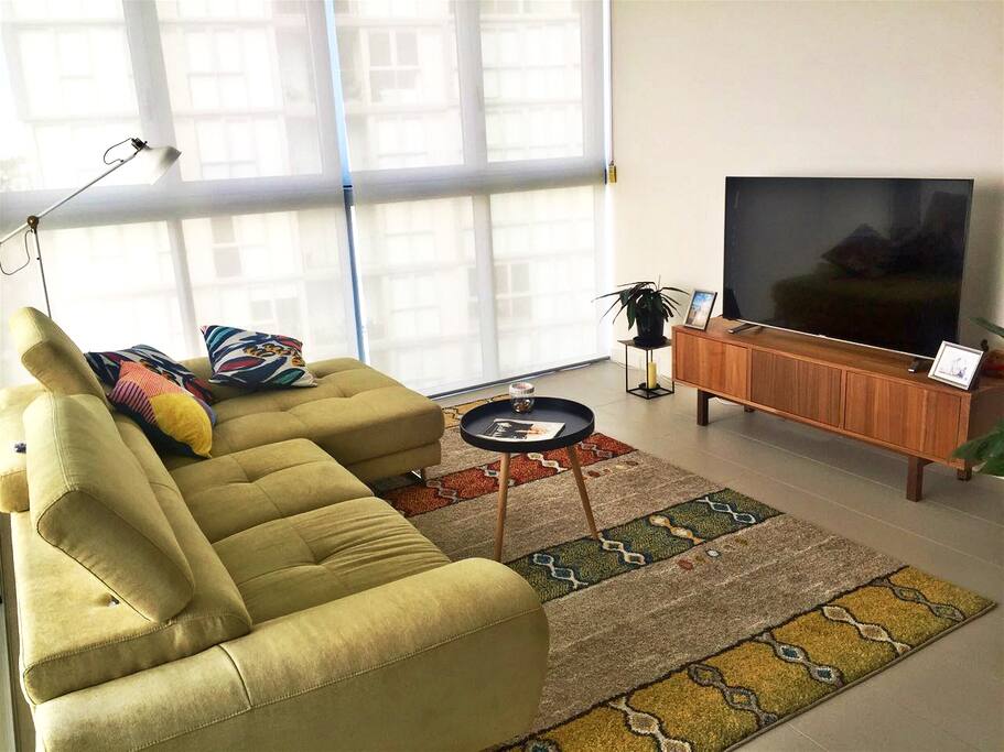 Spacious living area with 55inch 4K TV