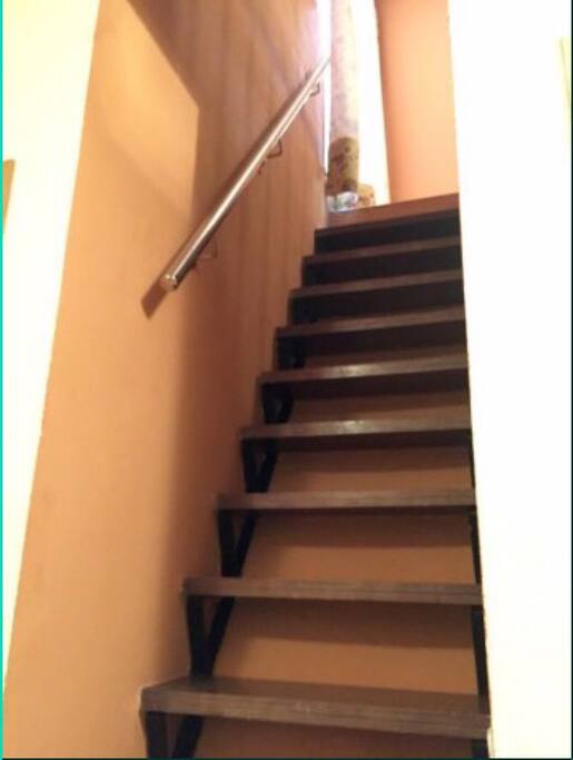 Escalera acceso a suit