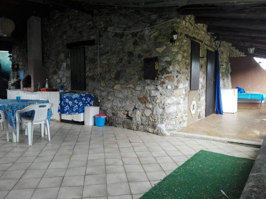 patio con cucina e barbecue