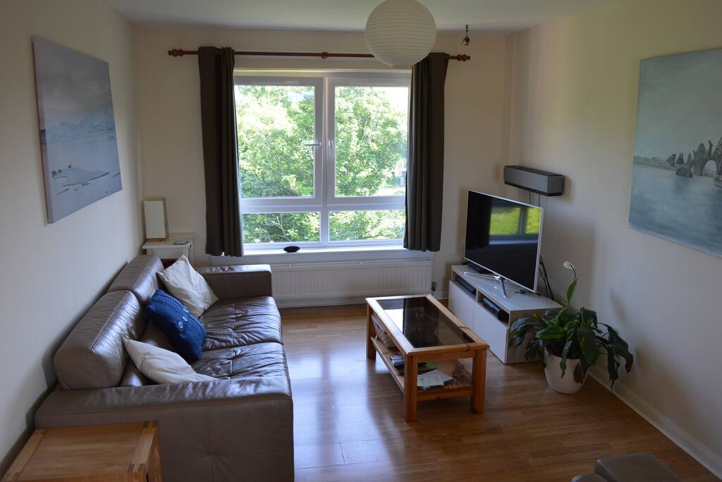 Living room, bright and airy, with great views and all the gadgets!