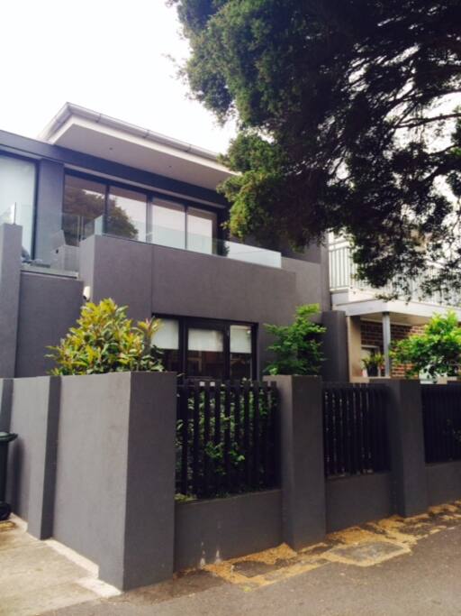 Front of the house, on quiet street with parking