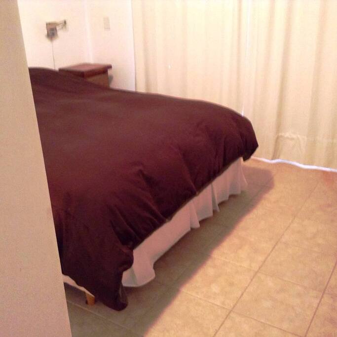 Dormitorio Principal en suite con salida al balcón