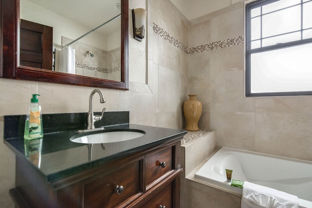 newly remodeled bathroom with large soaker tub