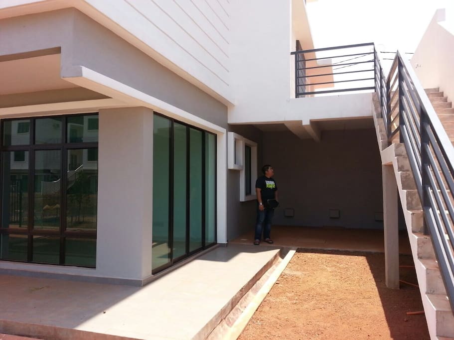 Outdoor stairs (on the right of the photo) to get to the entrance of a whole private lower ground (LG) floor. Parking is situated at the ground (G) floor,reserved for 1 car. Guest will be given a remote control access to the parking.