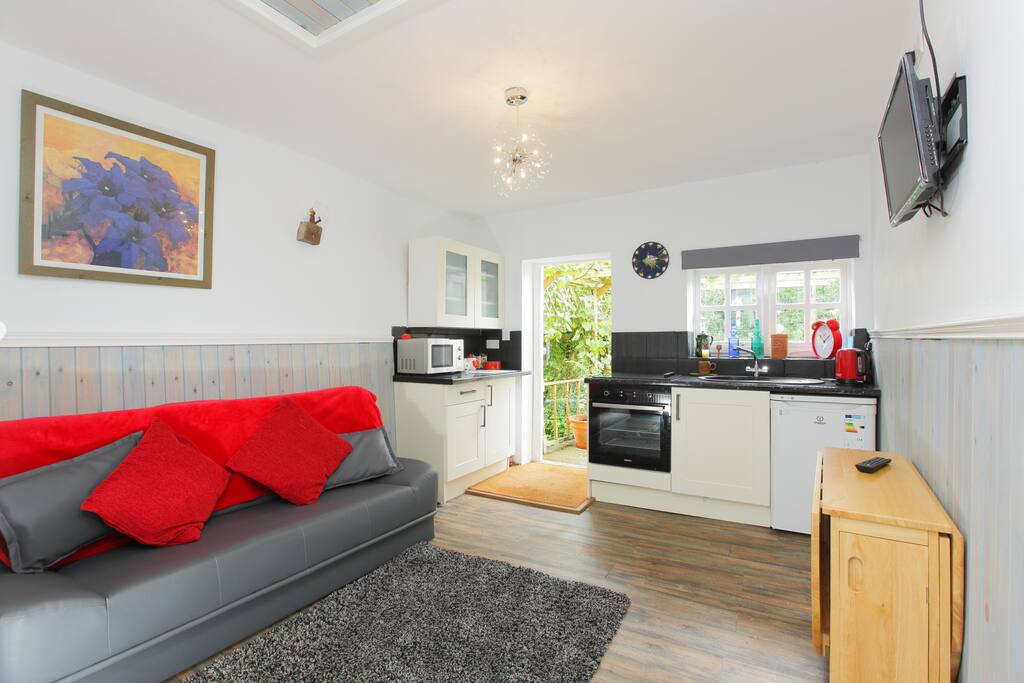 Lounge, dining, kitchen area.