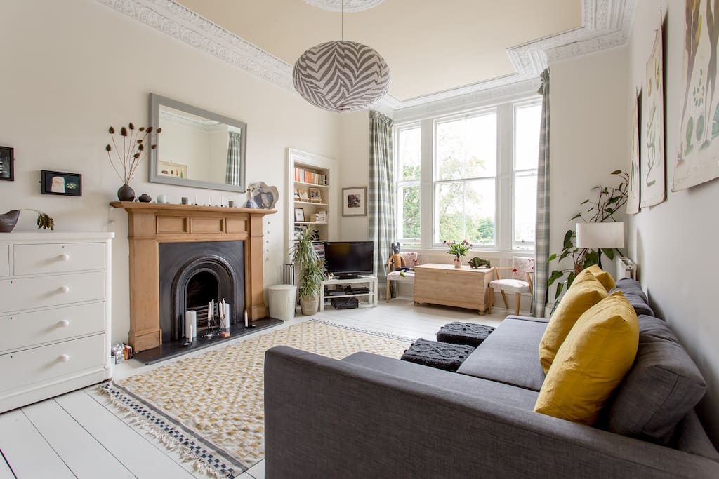 Large, bright living room, with original period features