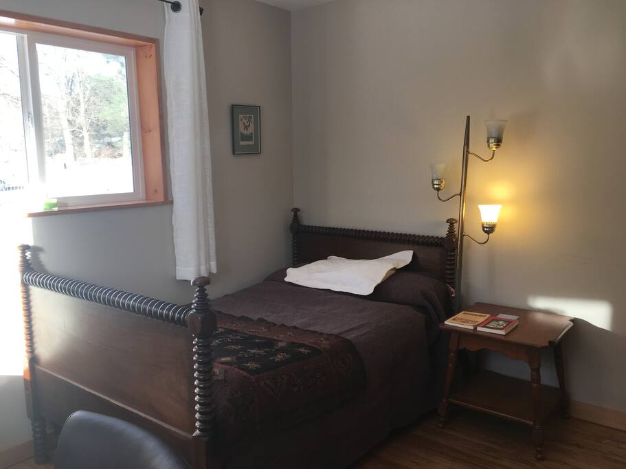 Antique, hand turned bed frame with new postupedic mattress