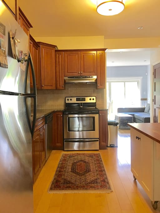 Eat-in kitchen with new stainless steel appliances