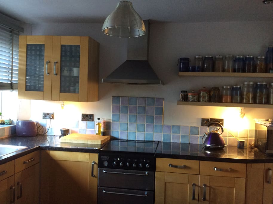 Kitchen with table/two chairs plus utility