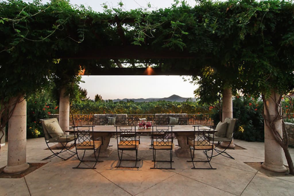 Outdoor dining with views of the vineyard and El Toro