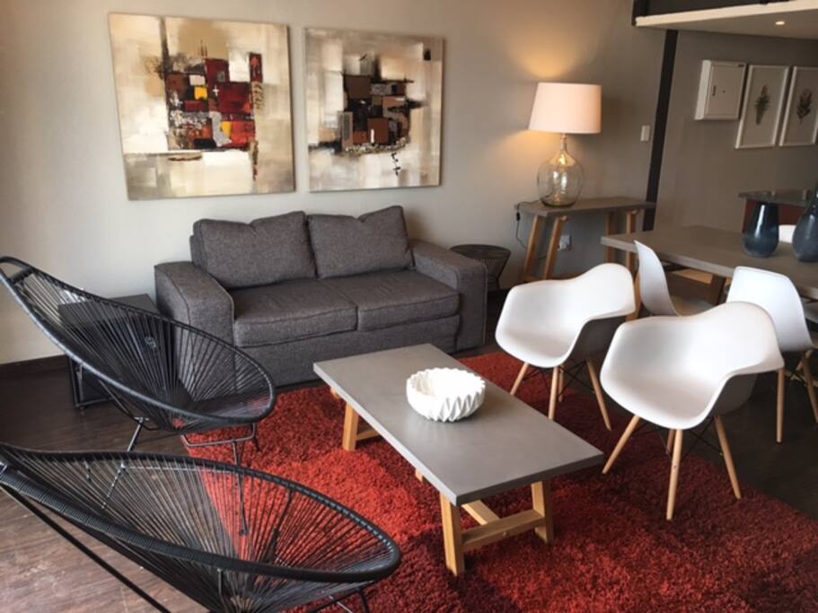 Open Plan Lounge and Dining Room with Double Sleeper Couch