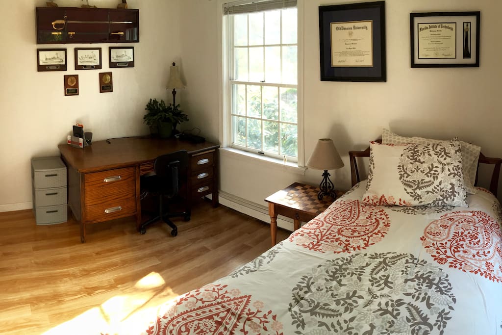 Bright sunny room with nice views of the back and side yard.