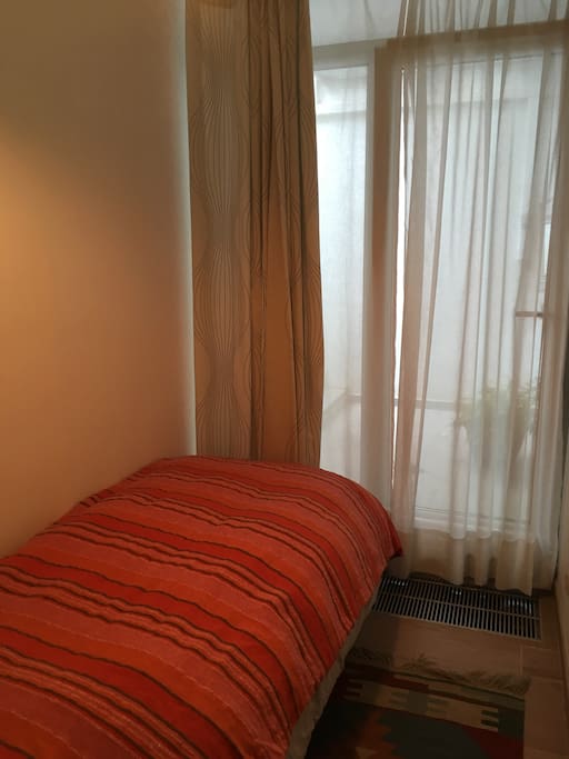 Single room - with window door entrance to patio and garden