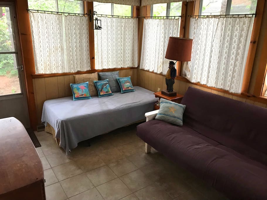 Back porch with twin bed and double futon
