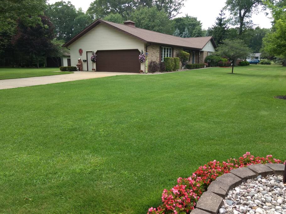 The driveway to the house is around the corner. Guests park in front of the big, detached garage to the left side of this picture.