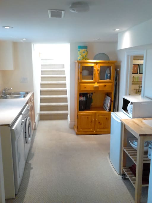 Kitchen area and private entrance to suite.