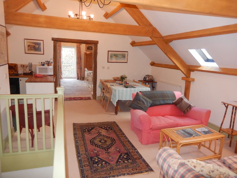 Sitting and dining area looking through to the bedroom