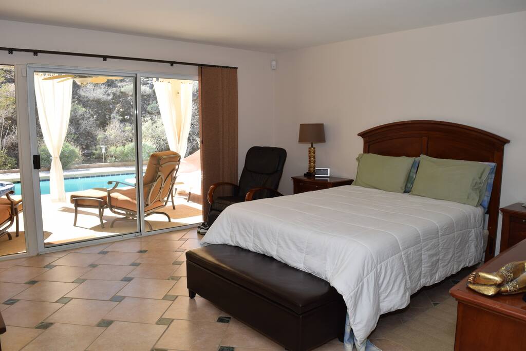 Oversize master suite with private bath and direct private pool / jacuzzi access