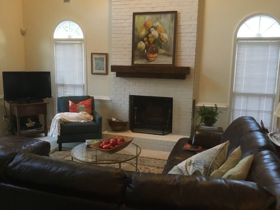 Spacious den, wood burning fireplace