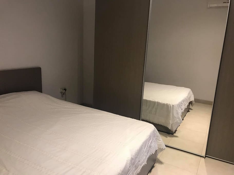 Bed and wardrobe