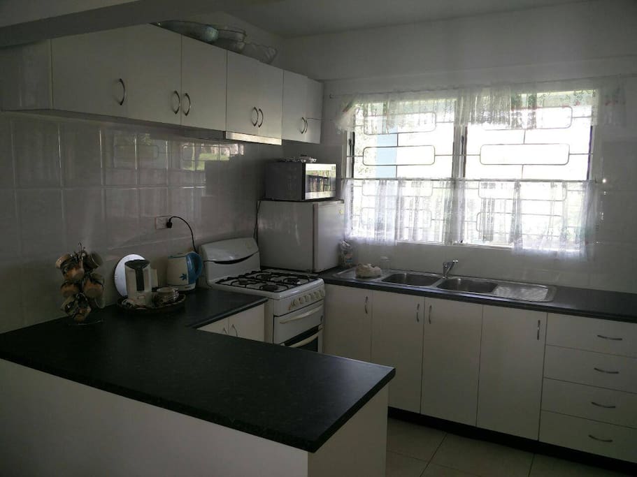 Spacious kitchen with modern facilities