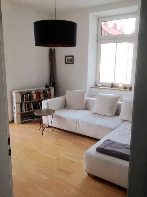 living room with extendable couch