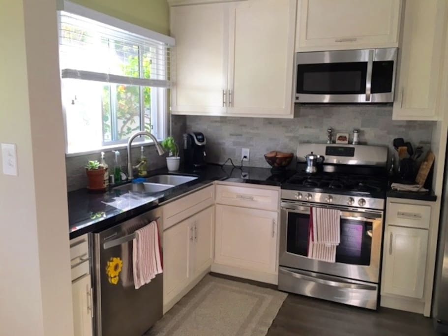 Granite countertops, stainless steel appliances