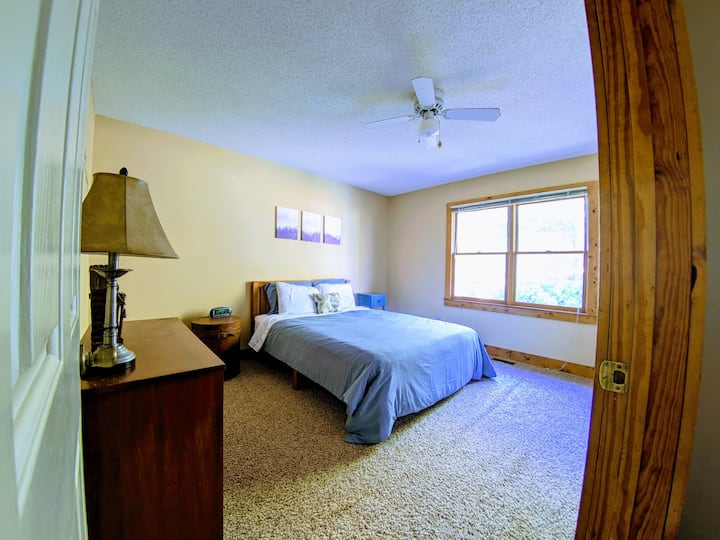The main floor bedroom 3 features a QUEEN size bed.