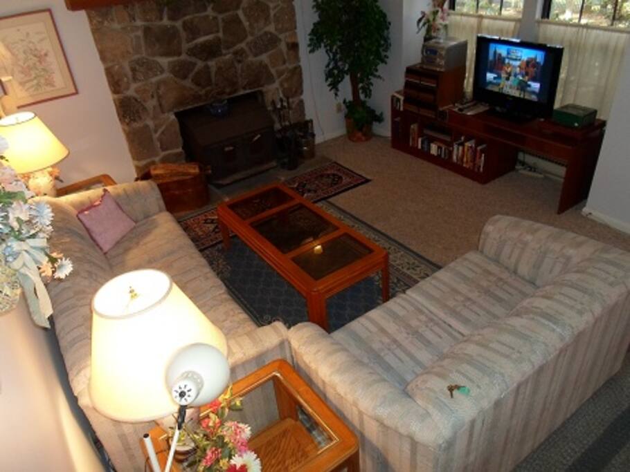 Living Room with woodstove, TV, internet