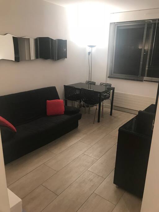 Living Room and dinning table; can seat 4.
