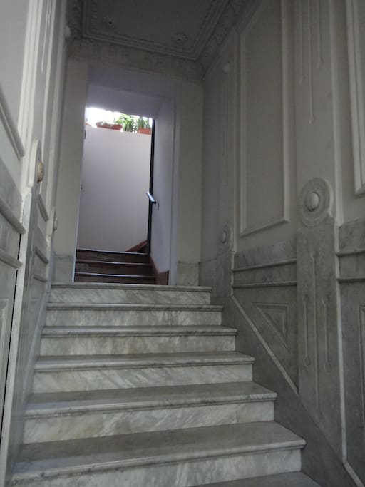 Entrance with marble staircase