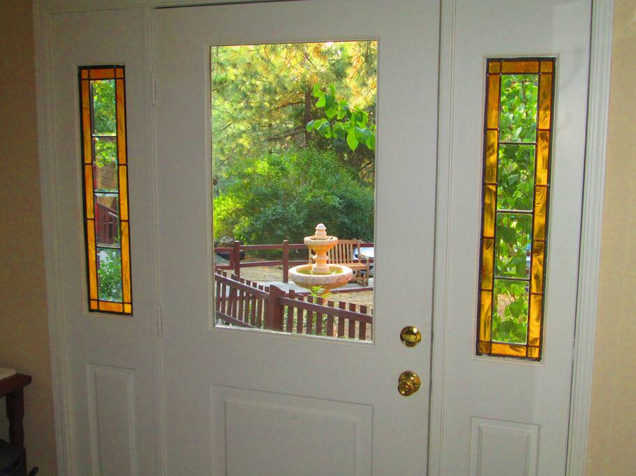 Watch the birds drinking water from your entry door