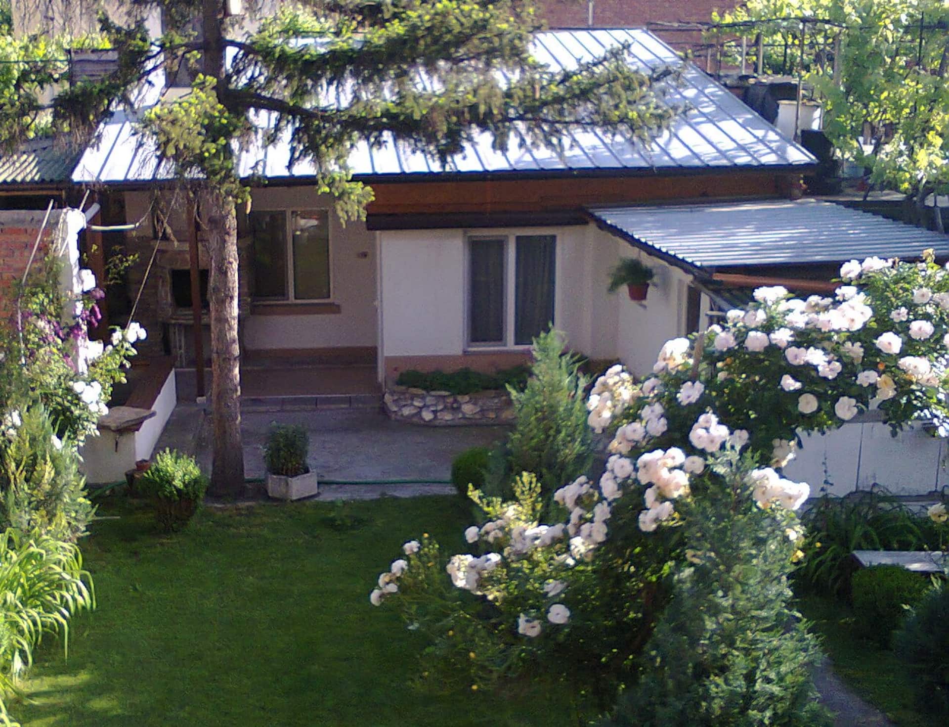 А cozy house with yard and waterfall in Plovdiv