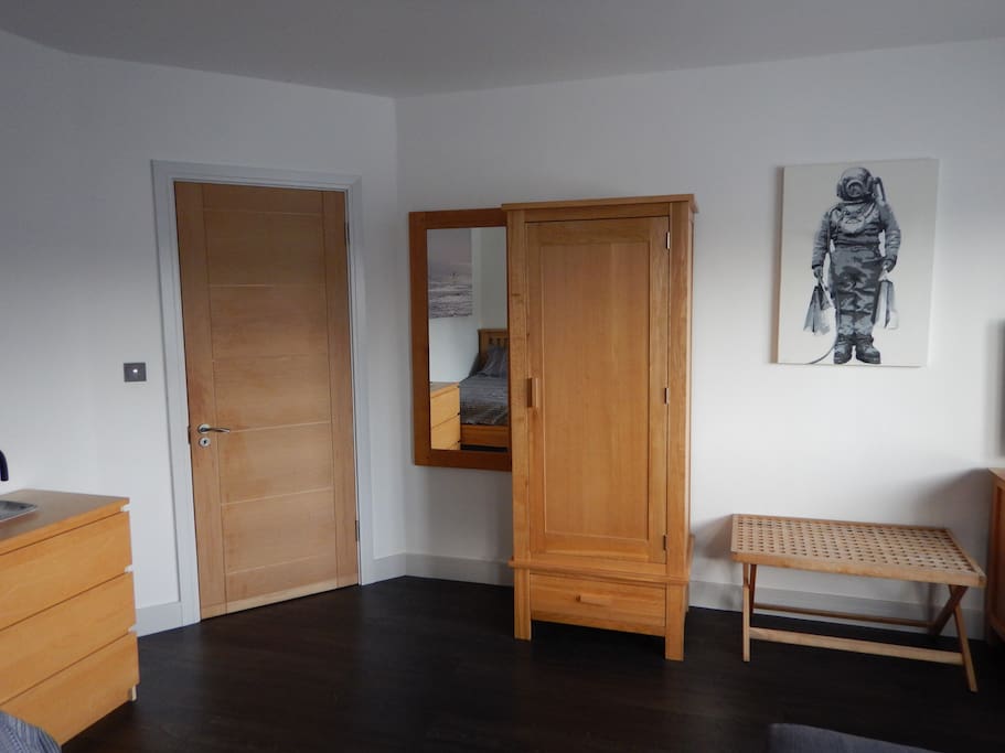 Large mirror and plenty of clothes storage