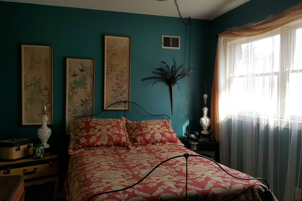 Bedroom #1, full-size bed with oriental theme.
