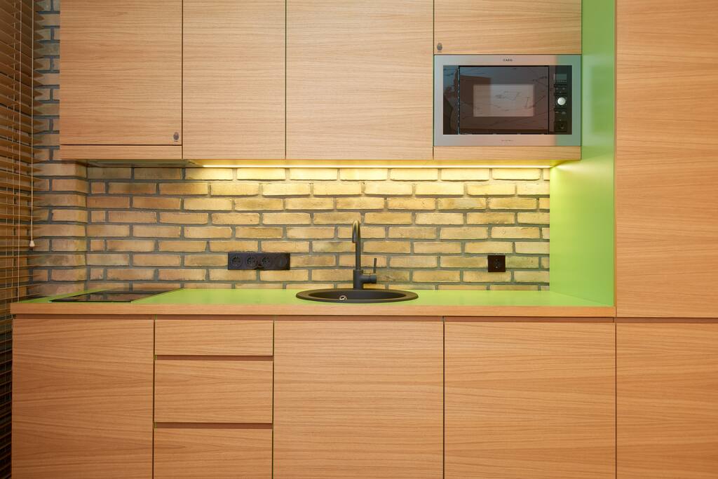 Kitchinette with all necessary equipment. Stove, microwave, fridge, dishes,glasses, pots etc....