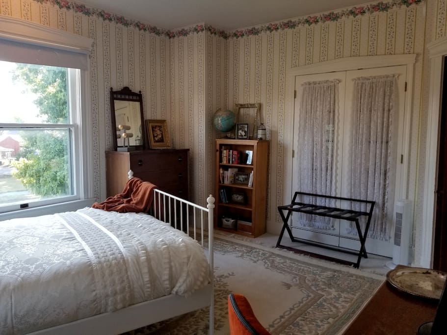Rose Room- there is a dresser, closet, luggage rack, and reading material for your use!