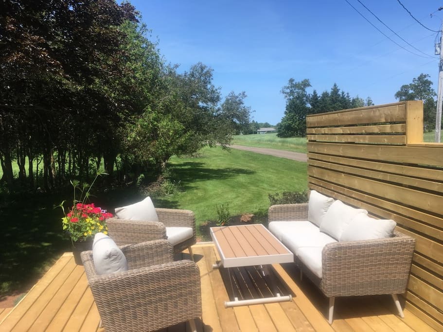 Comfortable wicker seating for reading, relaxing & enjoying a cold beverage.