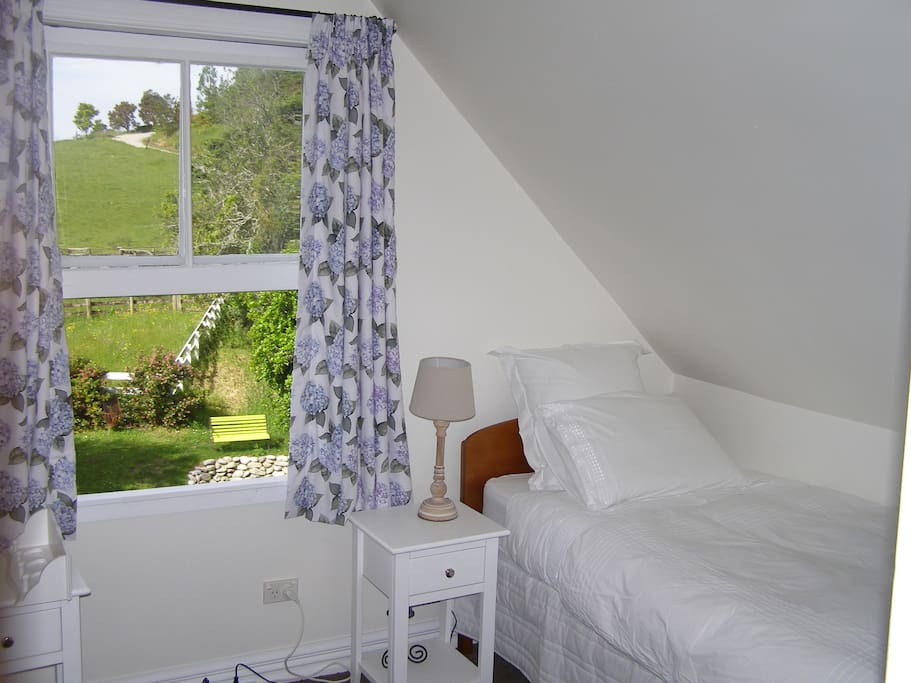 Upstairs fresh look twin room with rural outlook