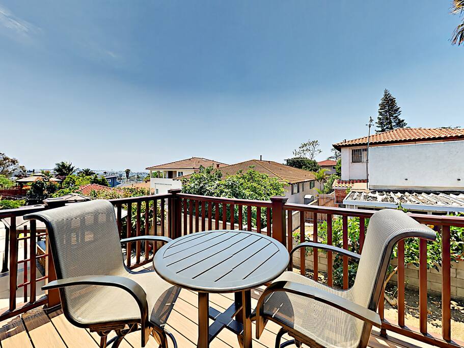 Sip coffee on the rooftop deck with seating for two