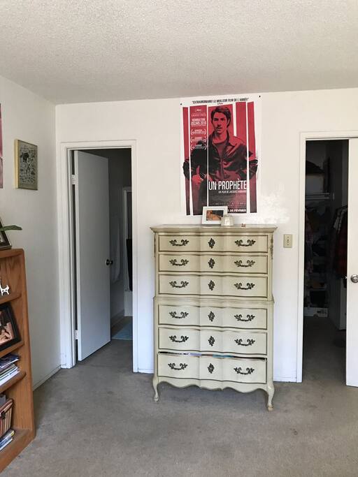 View of both the bathroom and the walk in closet from the bed