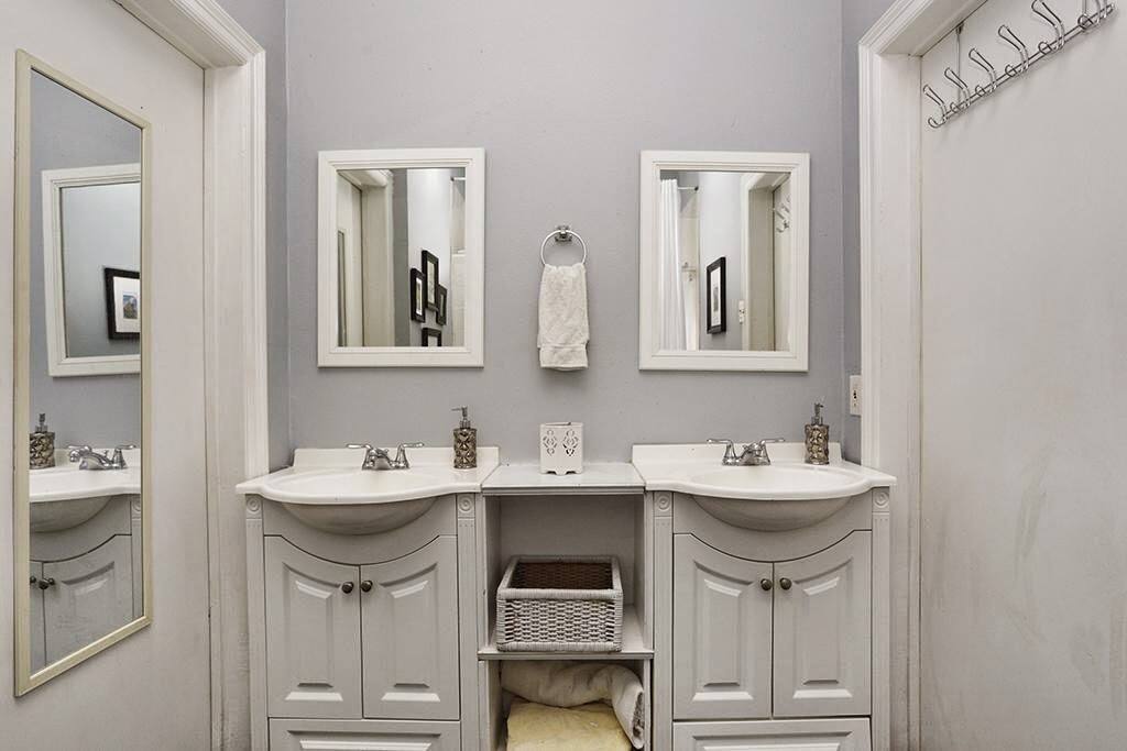 Double vanity in large bathroom.