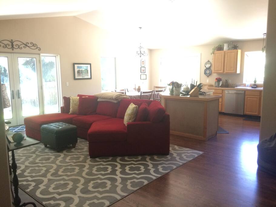 Great room leading into the kitchen and dining room