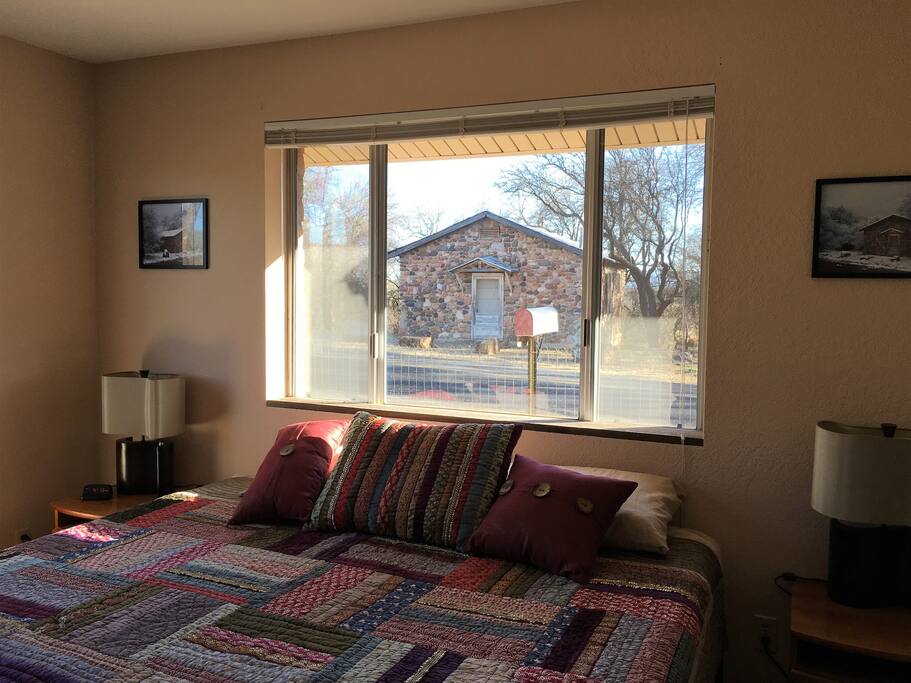 Bedroom with view of historic Stone Church across the street