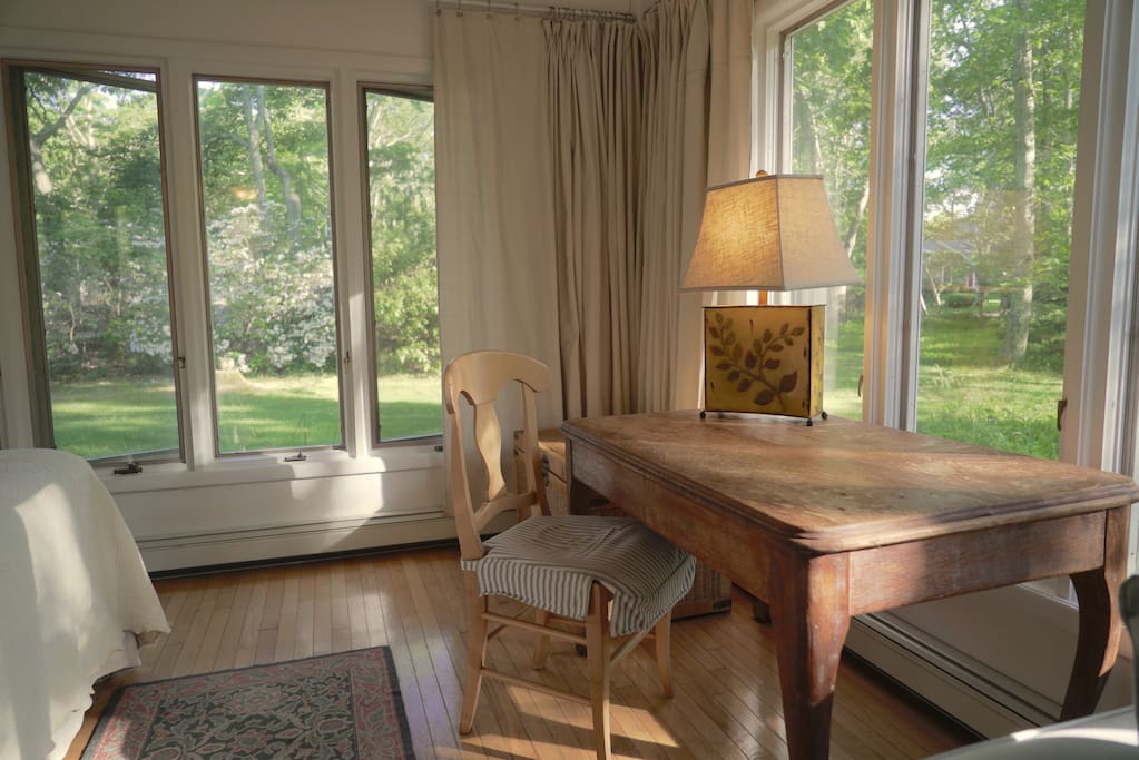 Corner Desk or Dining Table & Curtains that close all windows for sleeping in