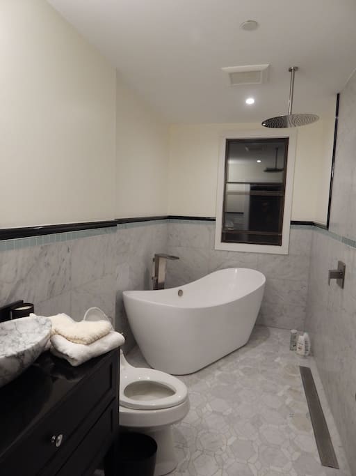 Full bathroom to yourself with shower and ginourmous tub.