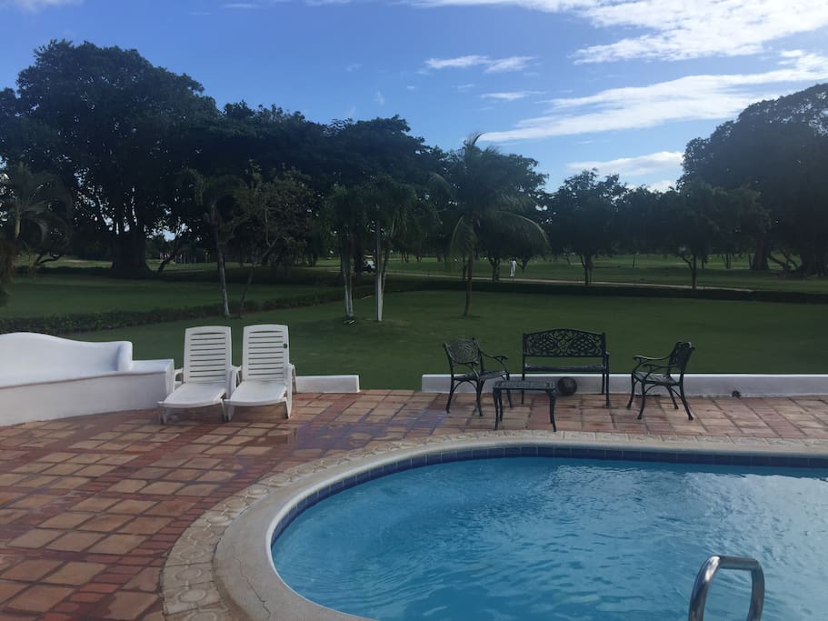 Pool with golf view.
