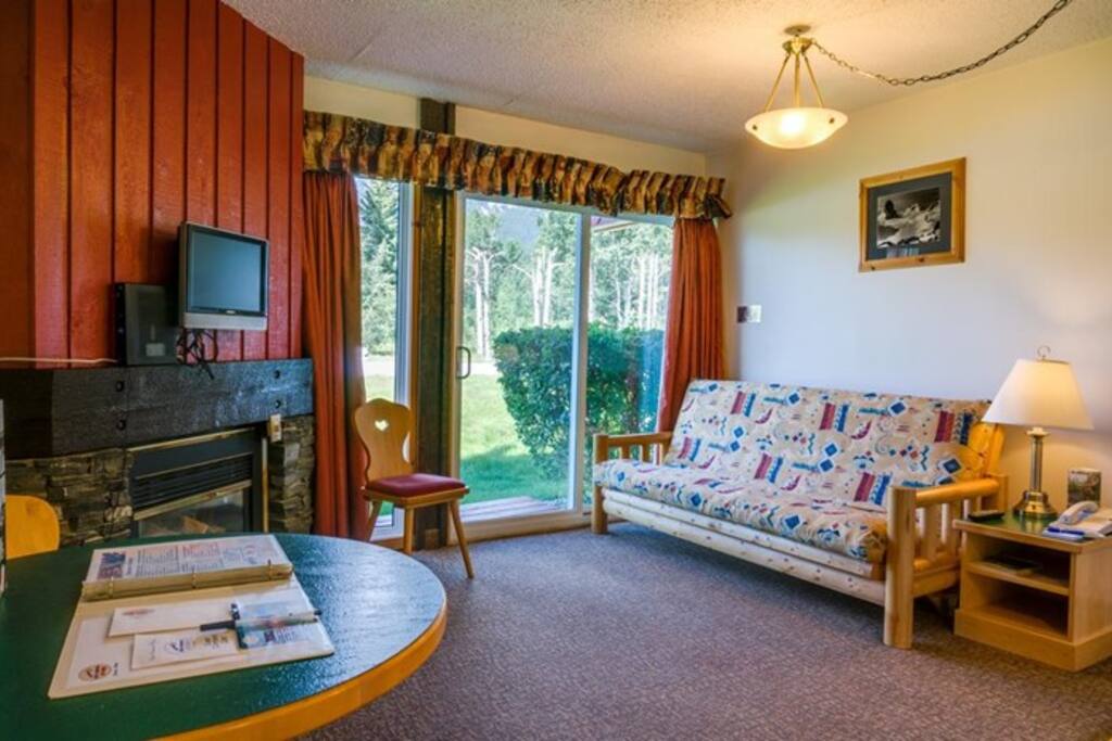 Enjoy the fresh mountain air with doors leading to the patio