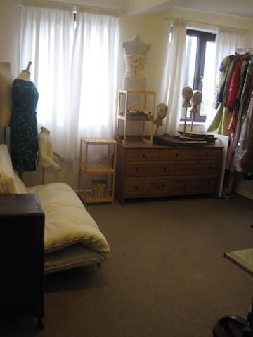 Light airy room near train station