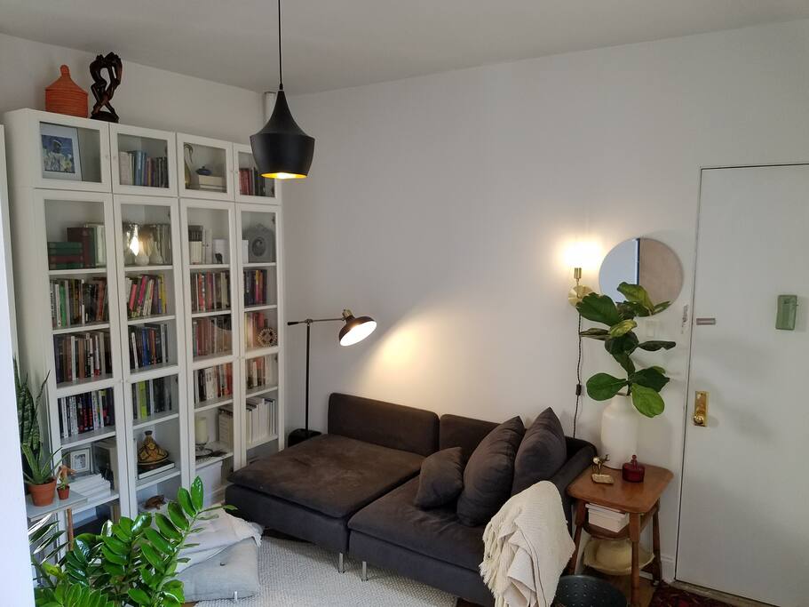 Cozy living room with access to our little library